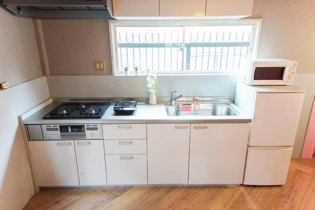 Sanacion Namba 難波千日前の5Ldk120平米 駅徒歩2分 広々バルコニーでバーベキューも可能 Apartman Oszaka Kültér fotó